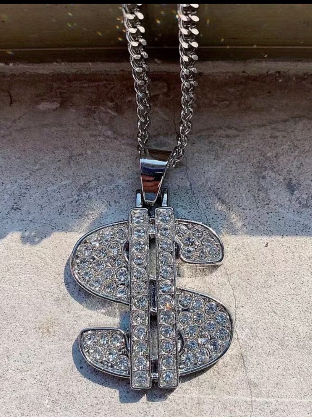 Dollar Sign Pendant Necklace with Clear Stones -
